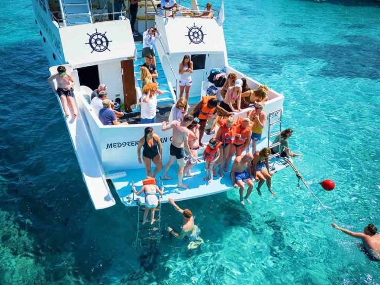 Guests swimming off the Mediterranean One boat, Blue Lagoon, Cyprus